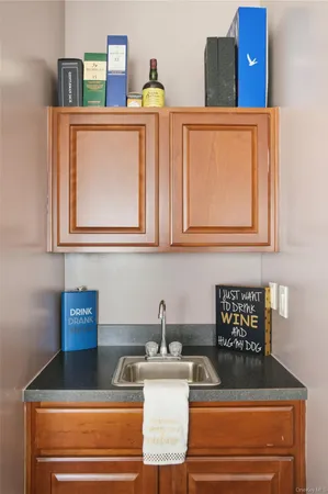 a kitchen with stainless steel appliances granite countertop a sink and cabinets