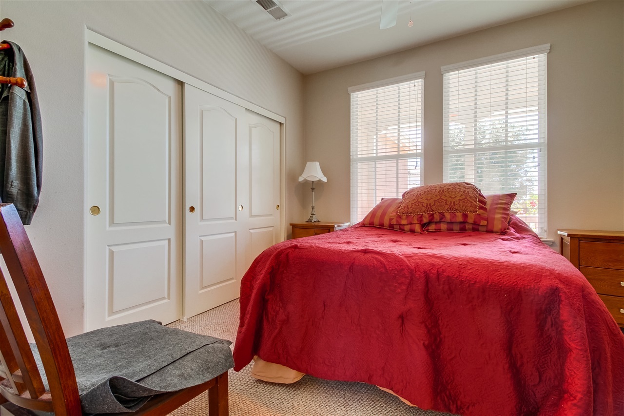 556 Hidden Trails Road Escondido, CA 92027 - Photo 14 of 25 Downstairs Bedroom / Den. Full bathroom off hallway entrance (not pictured).