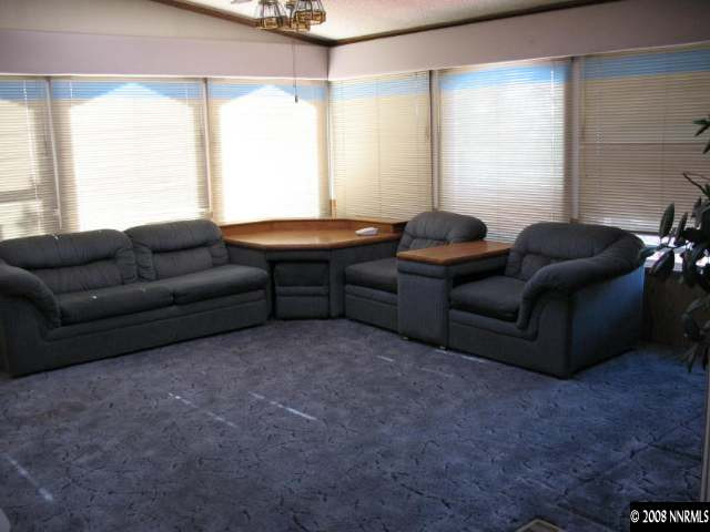 1525 Moon Lane Reno, NV 89521 - Photo 4 of 6 a living room with furniture and a large window