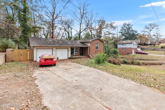 a car parked in front of a house