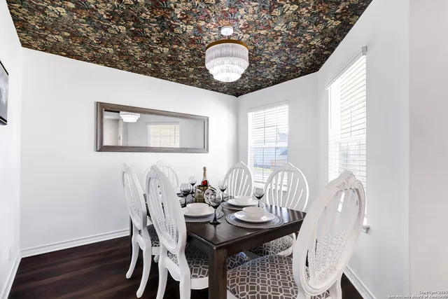 a table and chairs in a dining room