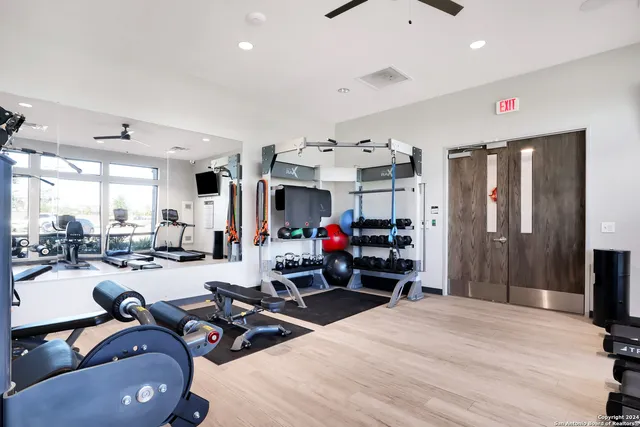 a view of a house with swimming pool and a yard