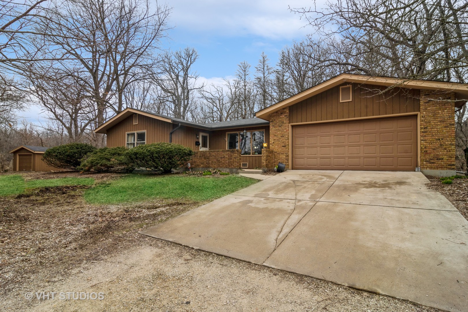 42W668 Pouley Road Elburn, IL 60119 - Photo 5 of 31 a front view of a house with yard and garage