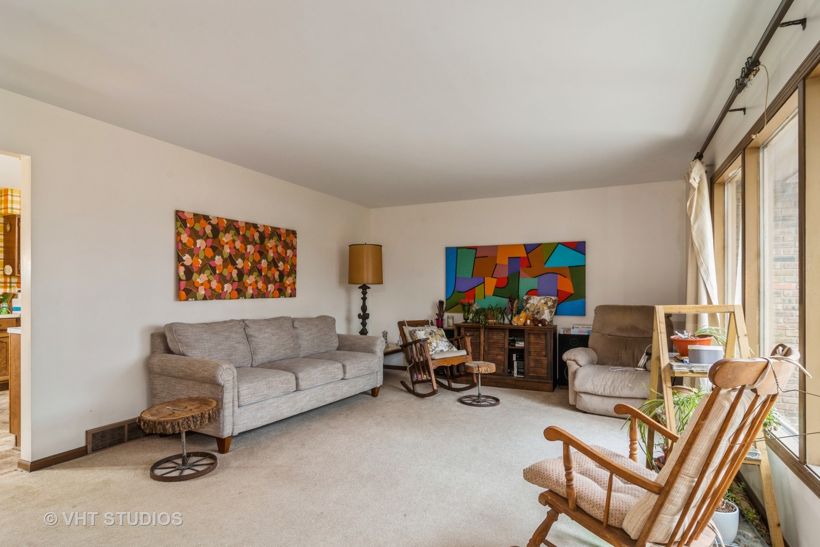 42W668 Pouley Road Elburn, IL 60119 - Photo 7 of 31 a living room with furniture and a flat screen tv