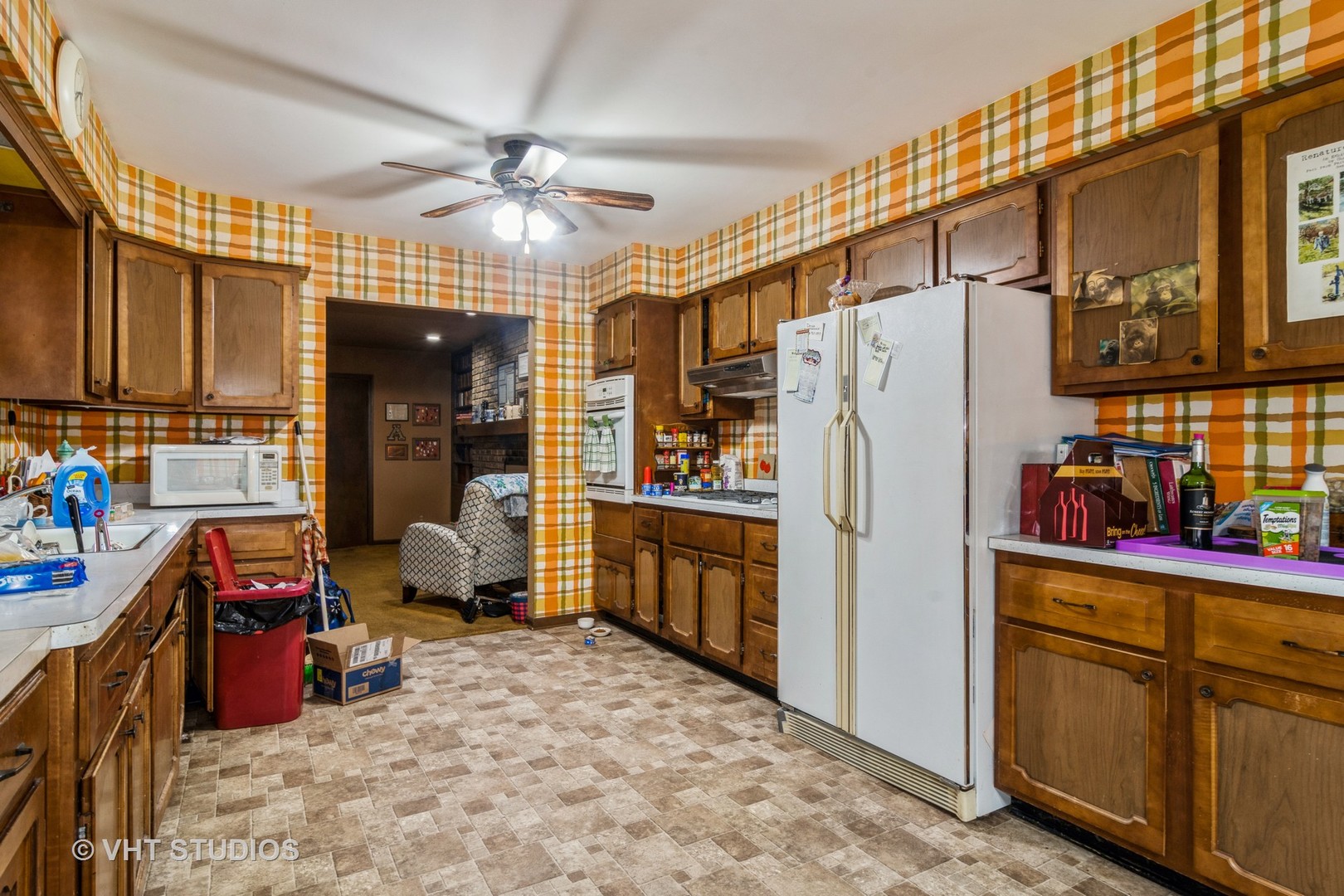 42W668 Pouley Road Elburn, IL 60119 - Photo 10 of 31 a kitchen with refrigerator and cabinets