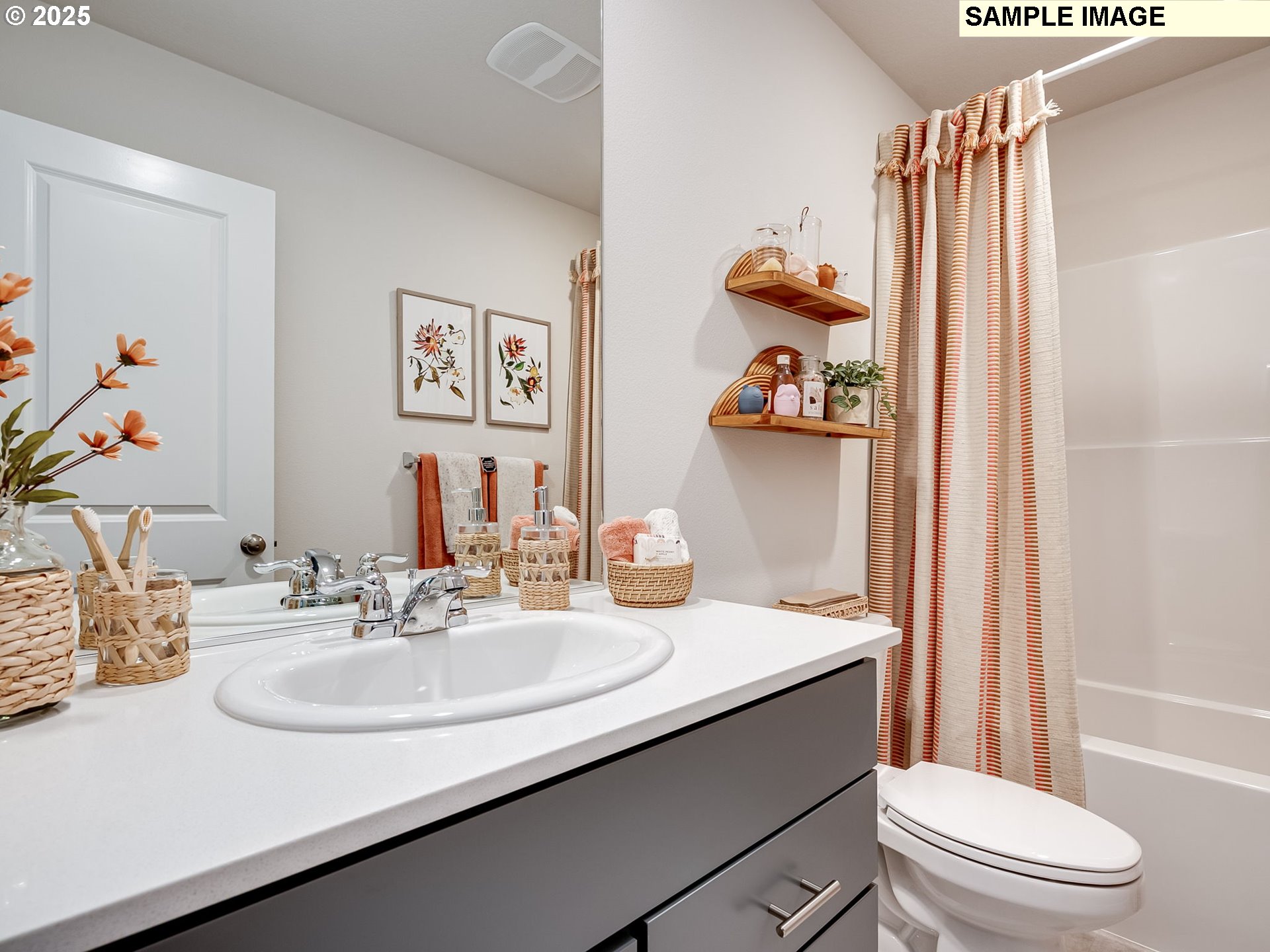 11206 Southeast Maxon Road Vancouver, WA 98664 - Photo 24 of 31 a bathroom with a sink a toilet and shower curtain