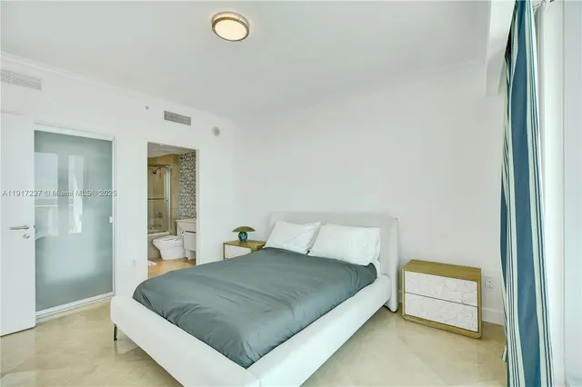 a view of a lobby with furniture and wooden floor