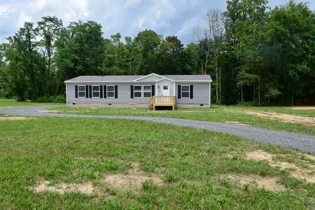 a house view with a garden space