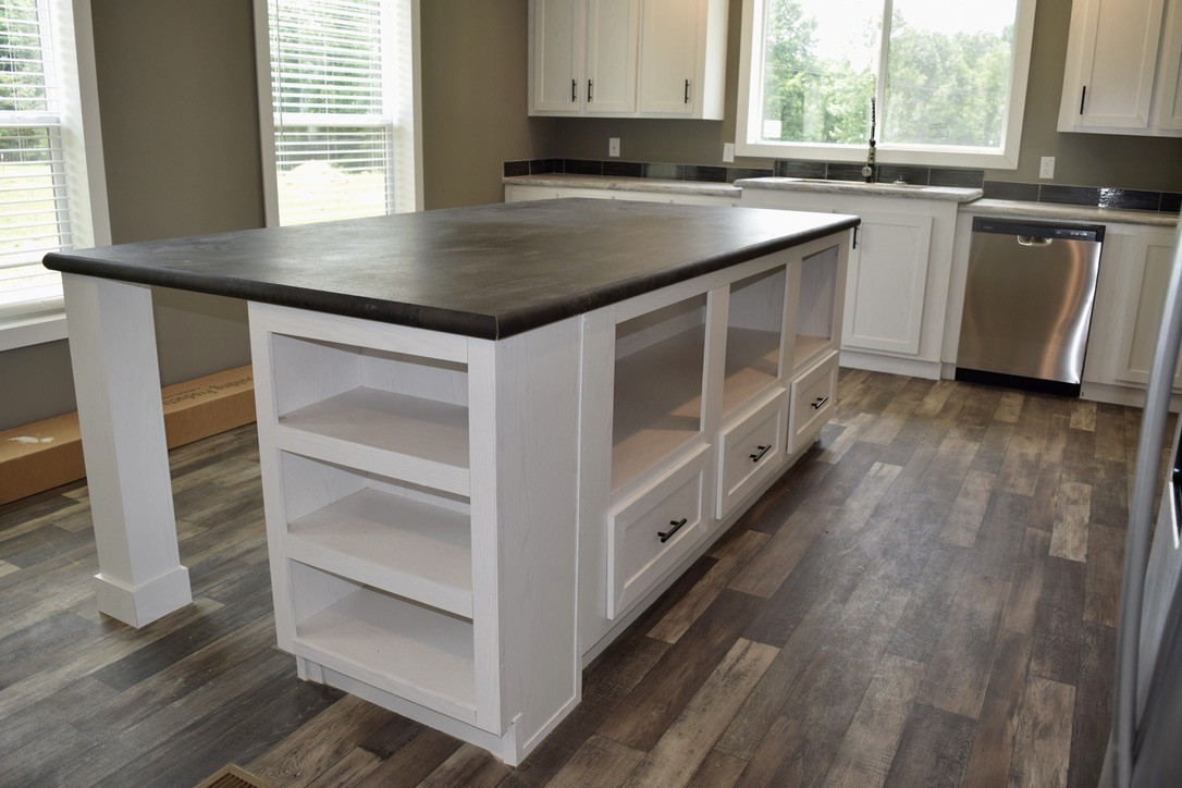 2166 Shrum Cemetery Road Westmoreland, TN 37186 - Photo 11 of 32 a kitchen with granite countertop a stove and a sink