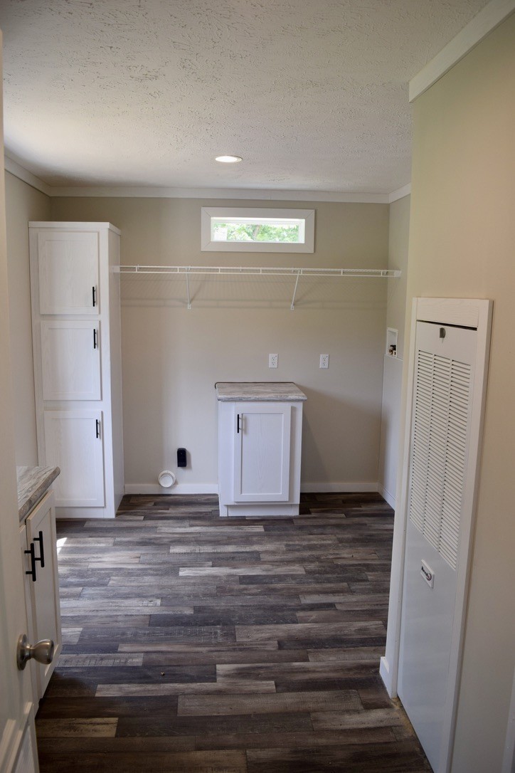 2166 Shrum Cemetery Road Westmoreland, TN 37186 - Photo 12 of 32 a view of a refrigerator in a room