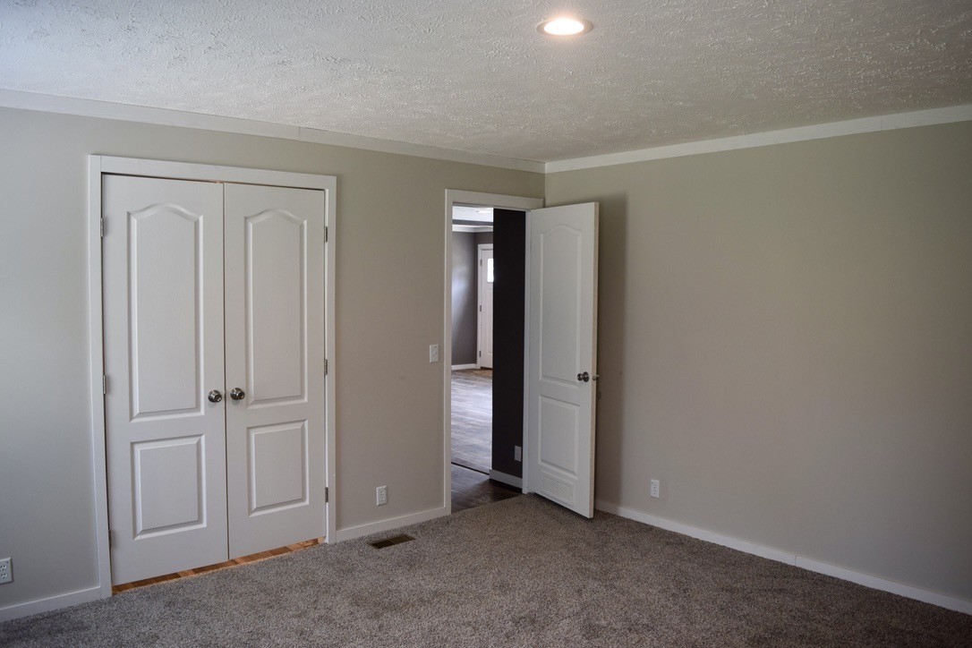 2166 Shrum Cemetery Road Westmoreland, TN 37186 - Photo 17 of 32 an empty room with closet area