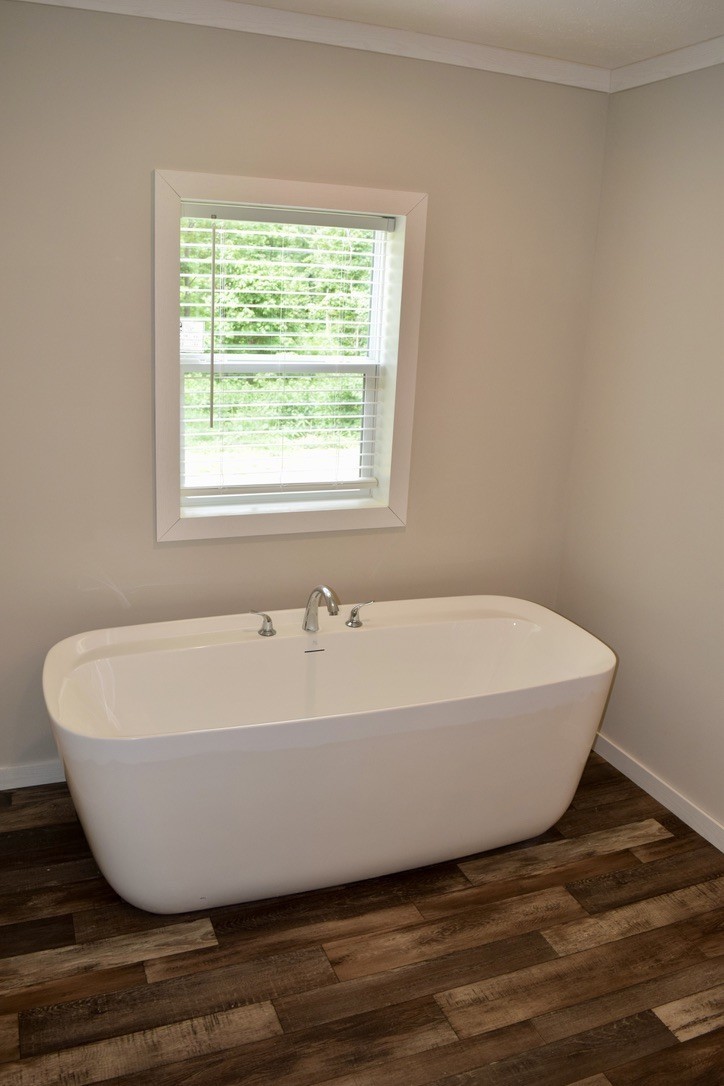 2166 Shrum Cemetery Road Westmoreland, TN 37186 - Photo 20 of 32 a white bath tub sitting in a bathroom