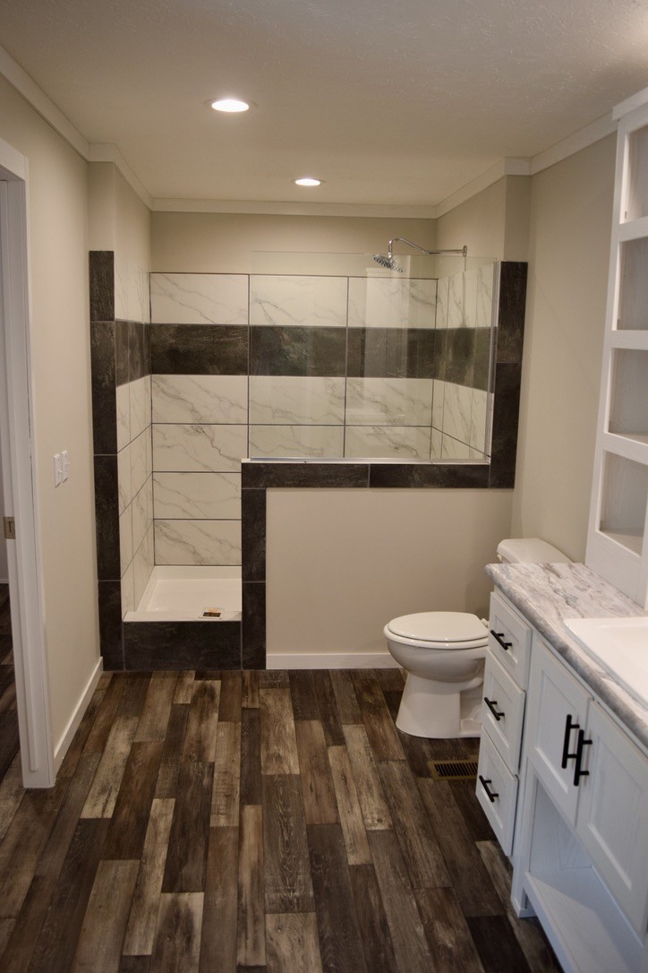 2166 Shrum Cemetery Road Westmoreland, TN 37186 - Photo 21 of 32 a bathroom with a sink and a toilet