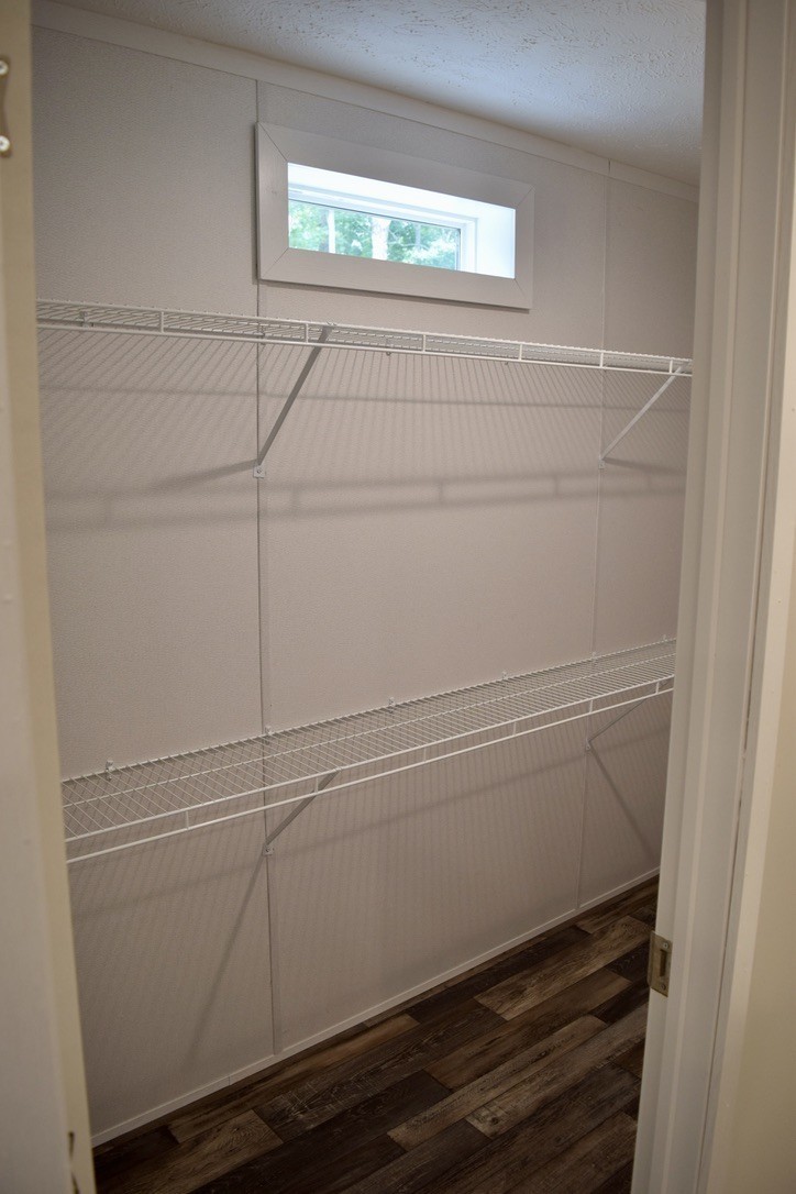 2166 Shrum Cemetery Road Westmoreland, TN 37186 - Photo 23 of 32 a view of an empty walk in closet