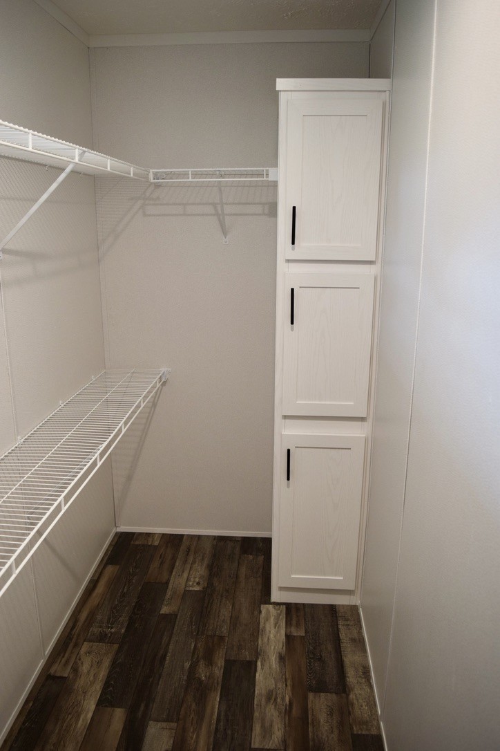 2166 Shrum Cemetery Road Westmoreland, TN 37186 - Photo 24 of 32 a view of walk in closet with empty racks
