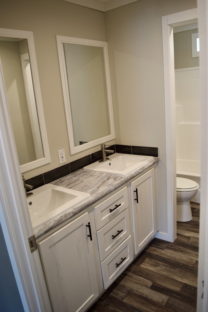 2166 Shrum Cemetery Road Westmoreland, TN 37186 - Photo 26 of 32 a bathroom with a sink and a toilet