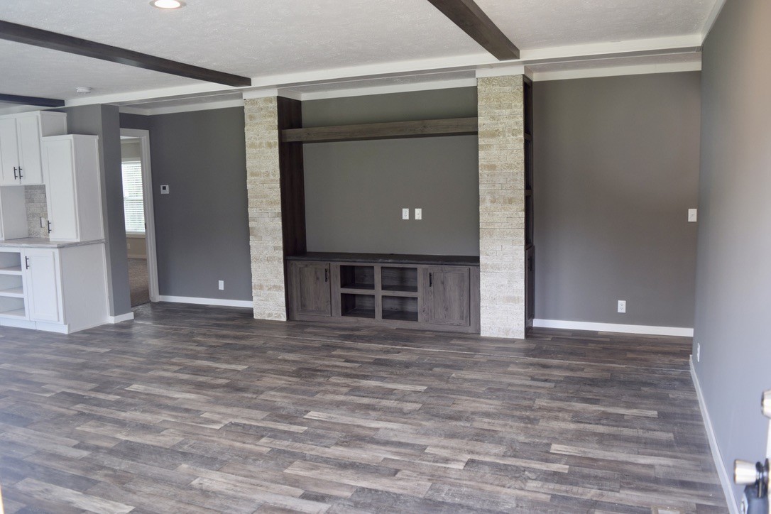 2166 Shrum Cemetery Road Westmoreland, TN 37186 - Photo 4 of 32 a view of empty room with wooden floor