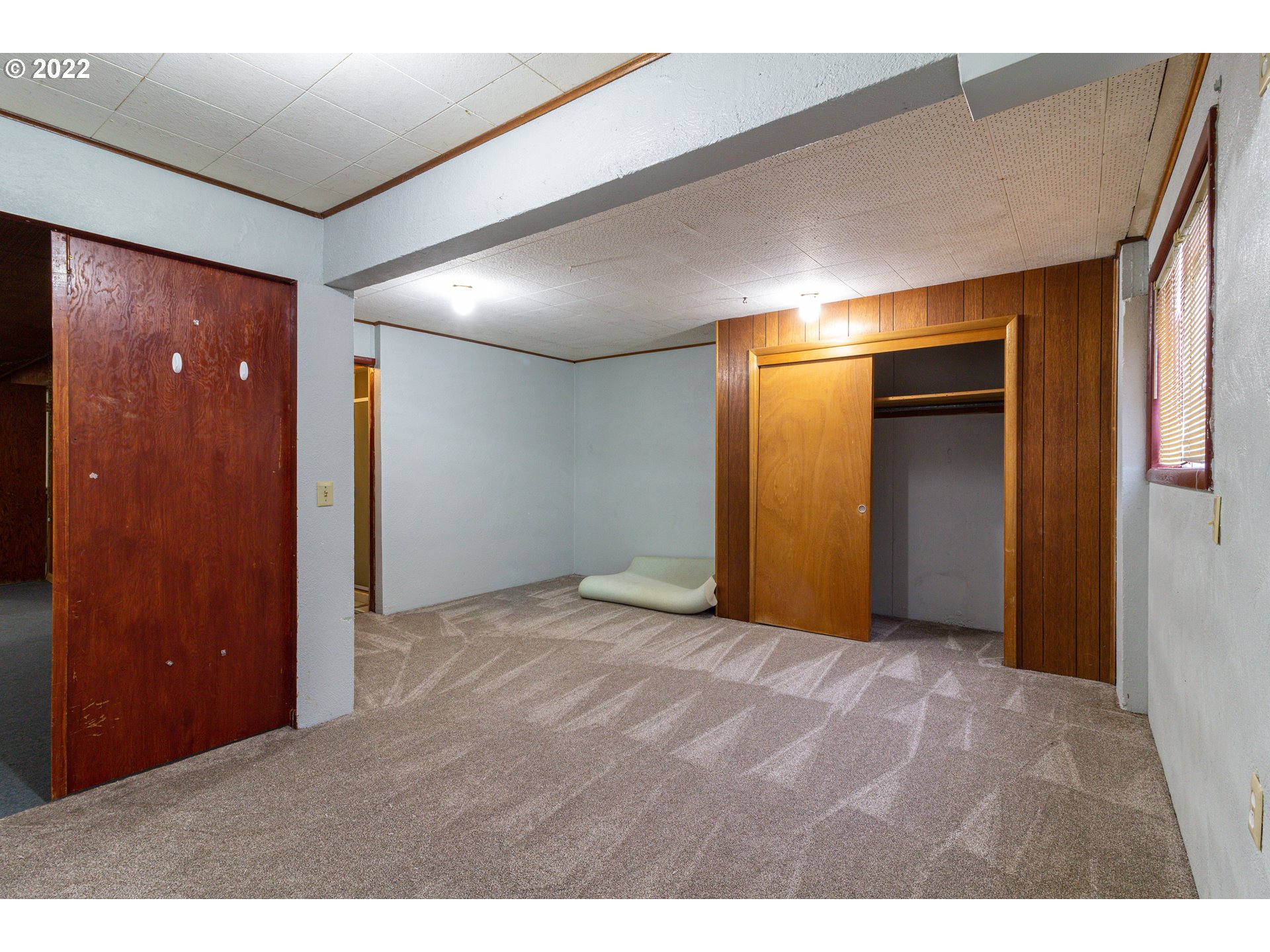 33225 West Spearman Road Hermiston, OR 97838 - Photo 28 of 32 a view of an empty room with closet and wooden floor