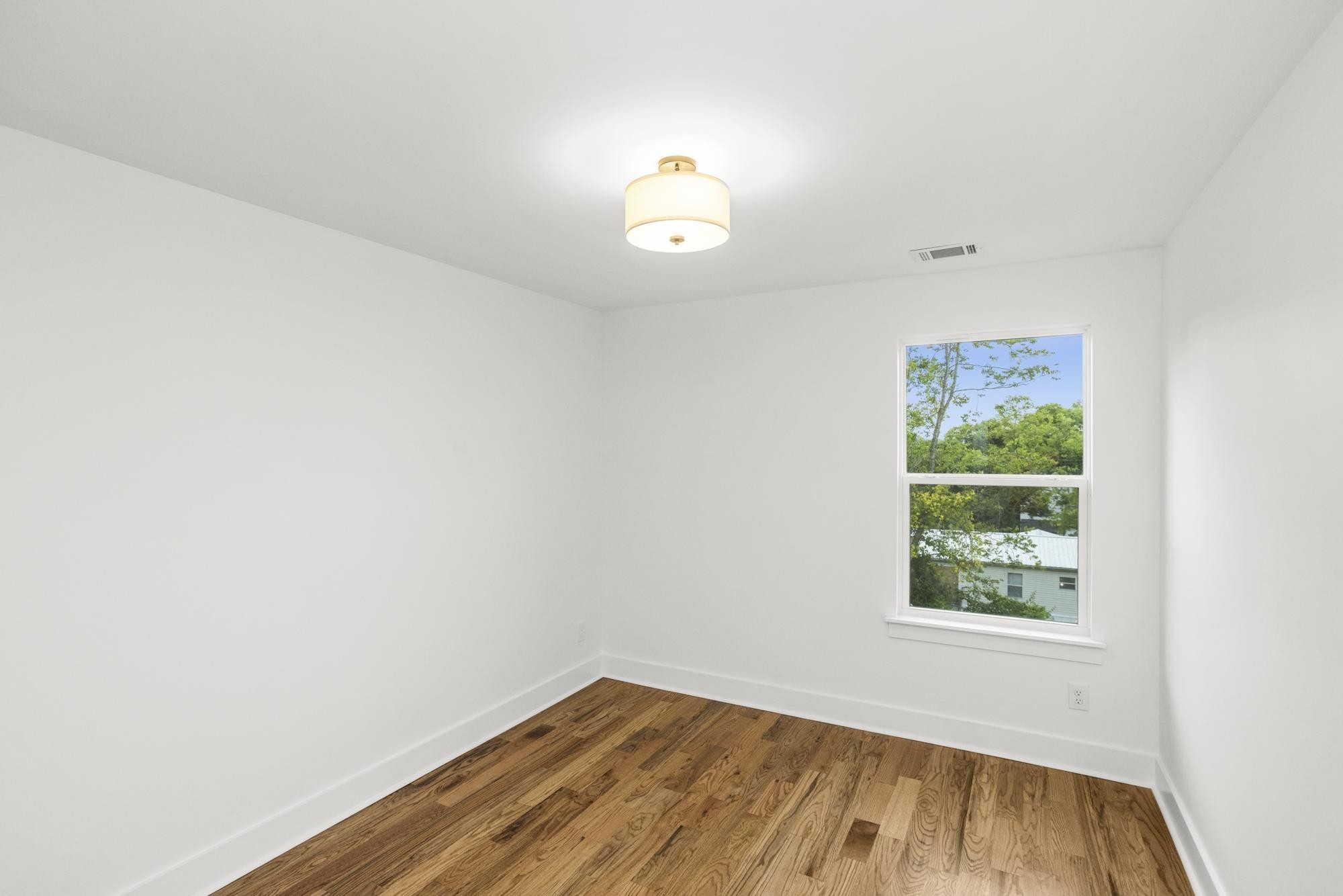 656 Chambers Street, Unit 140 Gallatin, TN 37066 - Photo 14 of 40 a view of an empty room with a window