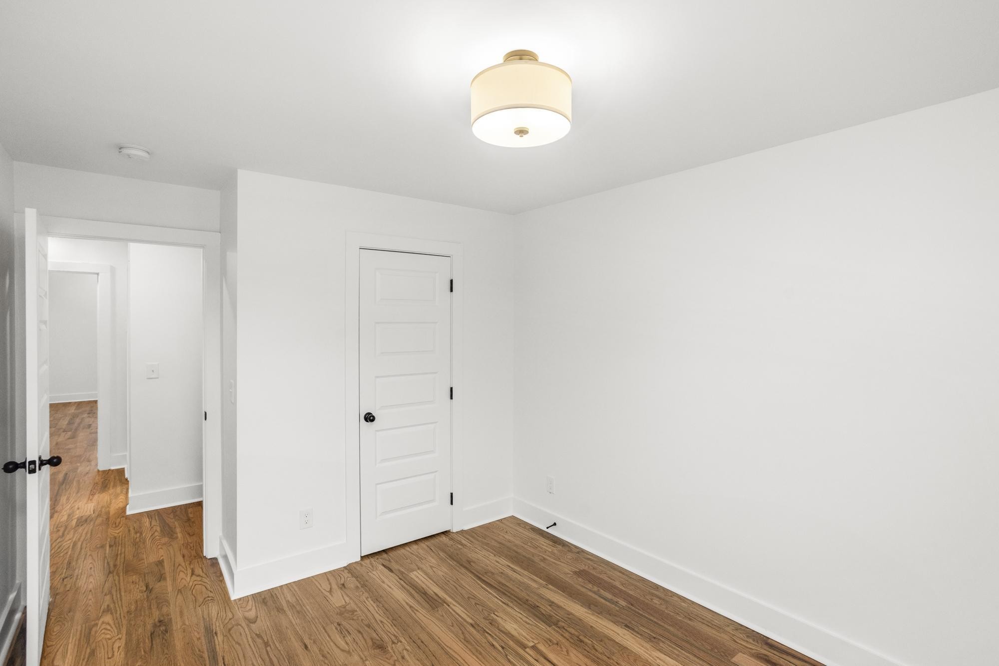 656 Chambers Street, Unit 140 Gallatin, TN 37066 - Photo 15 of 40 a view of a room with wooden floor