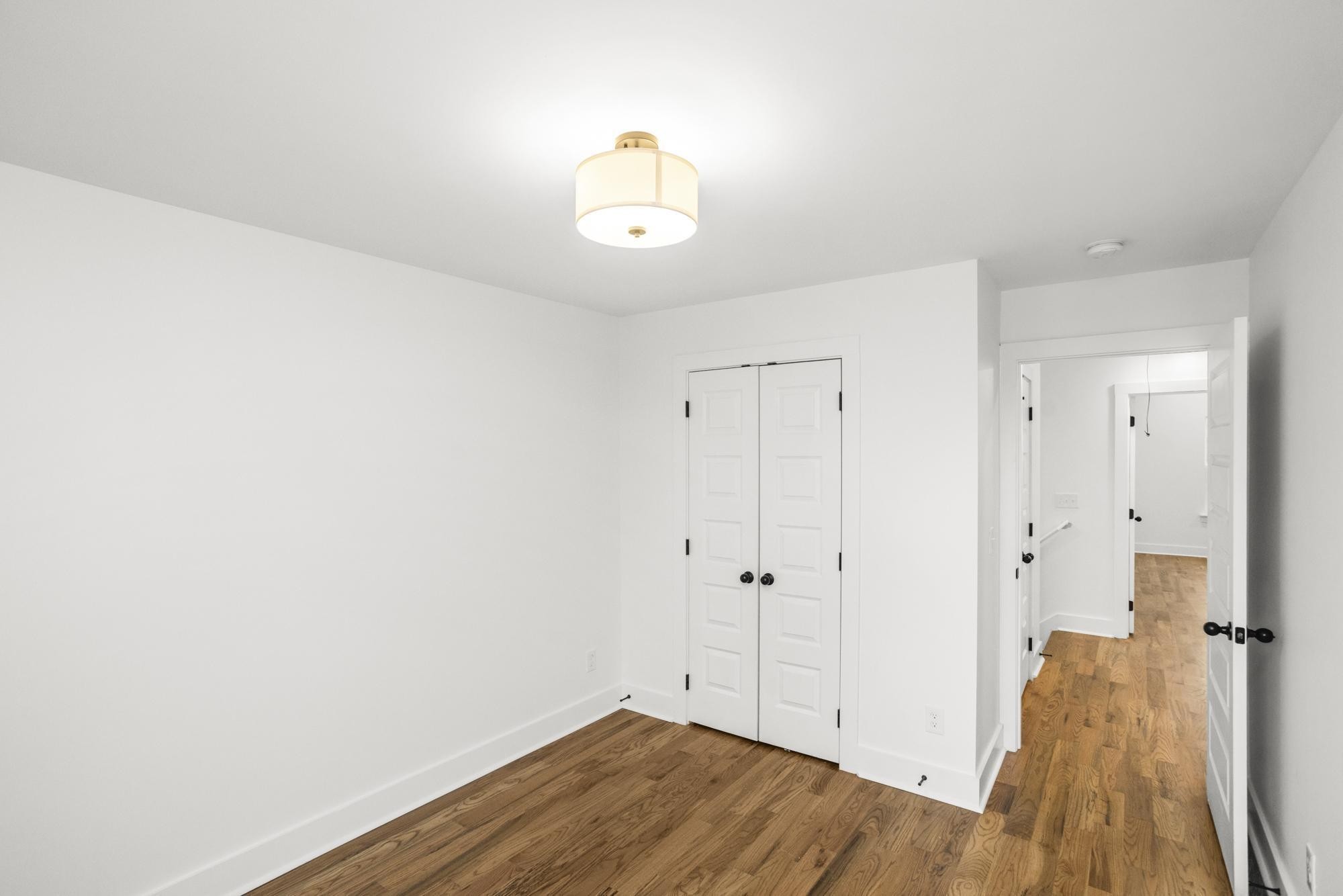 656 Chambers Street, Unit 140 Gallatin, TN 37066 - Photo 17 of 40 a view of a room with wooden floor