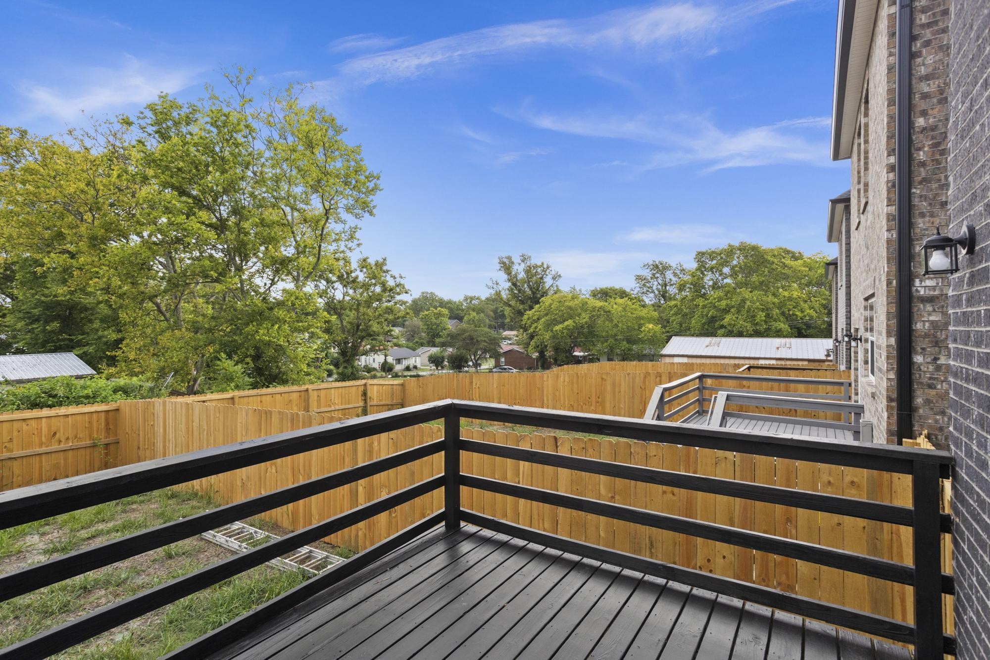 656 Chambers Street, Unit 140 Gallatin, TN 37066 - Photo 25 of 40 a view of balcony with wooden floor and fence