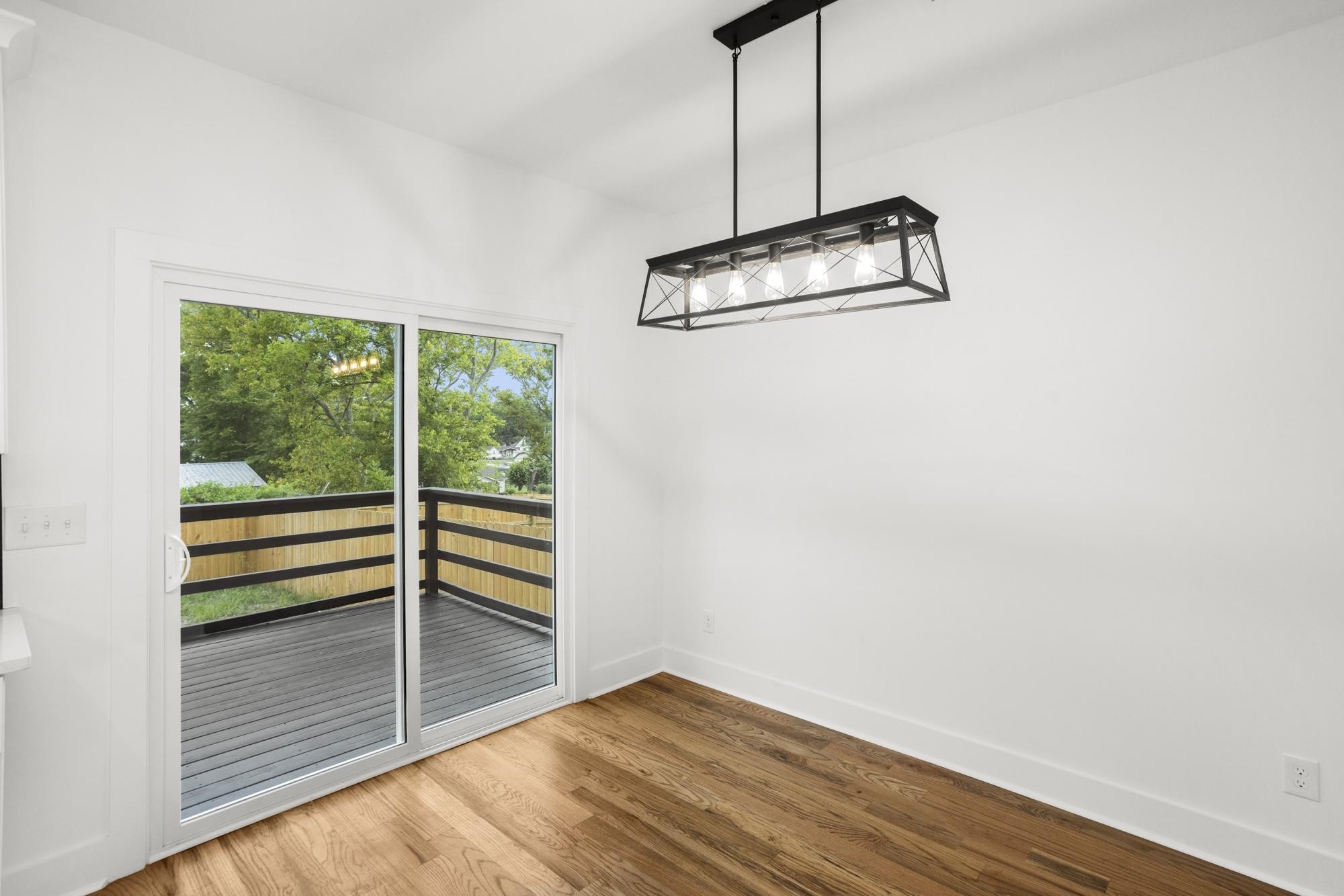 656 Chambers Street, Unit 140 Gallatin, TN 37066 - Photo 27 of 40 a view of a room with wooden floor and white walls