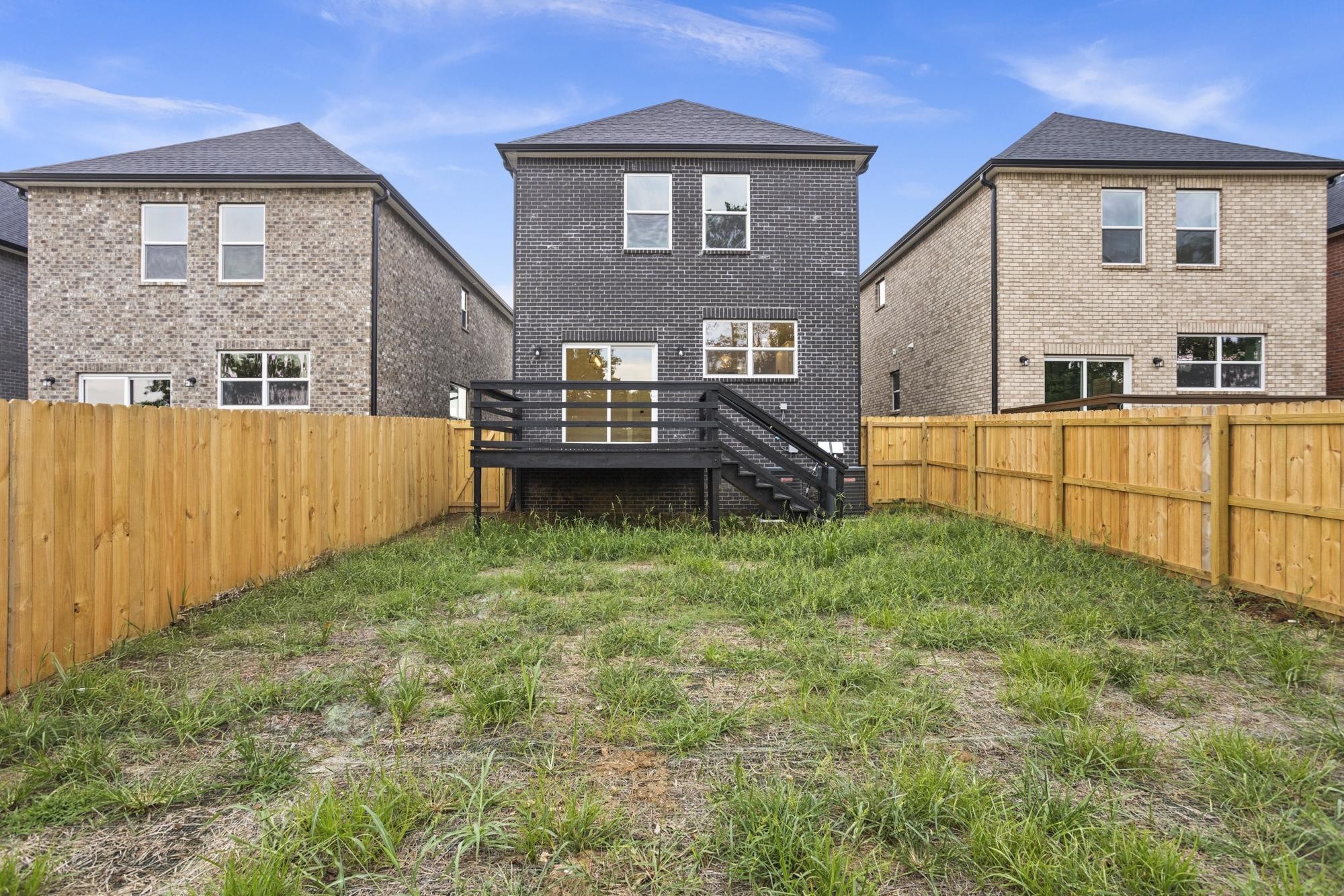 656 Chambers Street, Unit 140 Gallatin, TN 37066 - Photo 30 of 40 a front view of a house with a yard