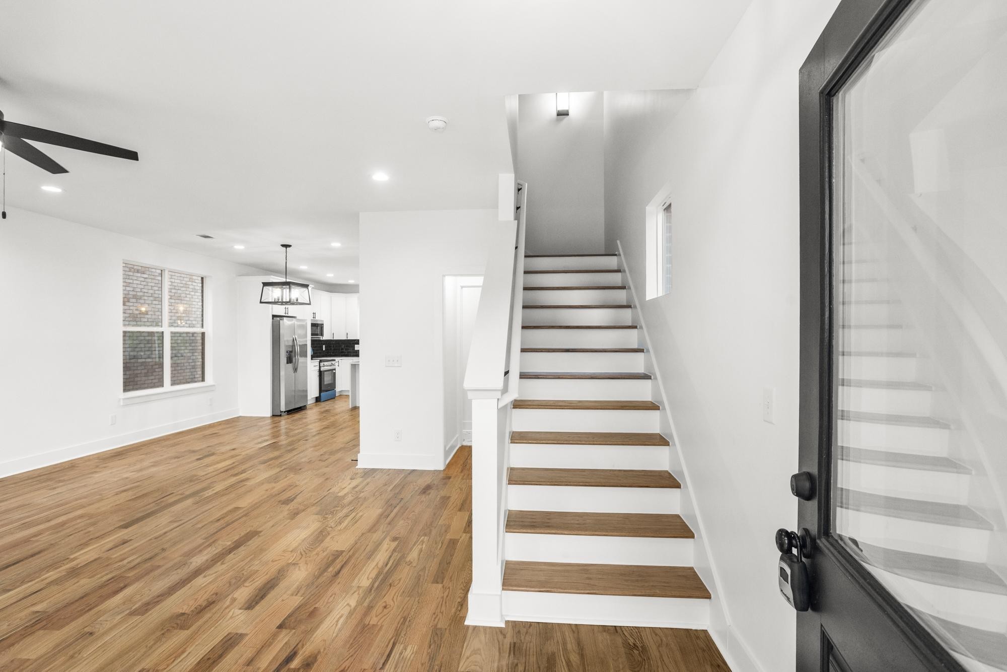 656 Chambers Street, Unit 140 Gallatin, TN 37066 - Photo 9 of 40 a view of entryway with wooden floor and stairs