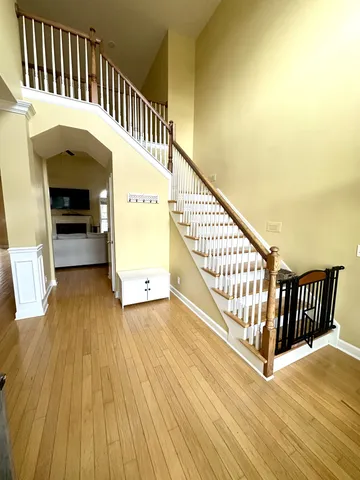 a view of entryway with wooden floor