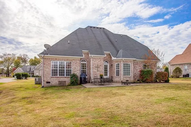 a view of a house with a swimming pool