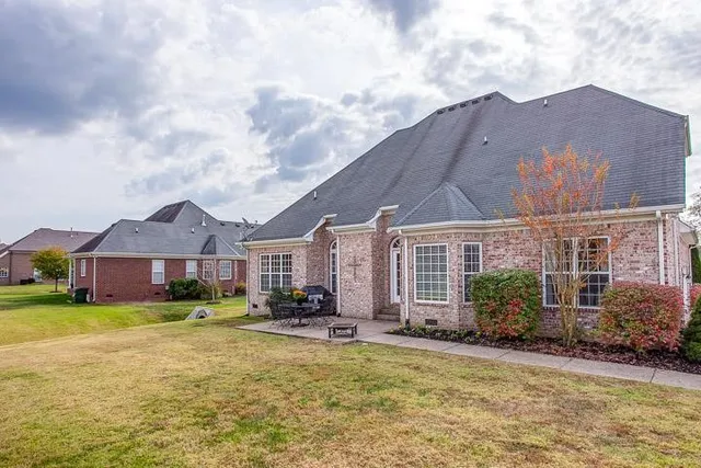 a house view with a garden space