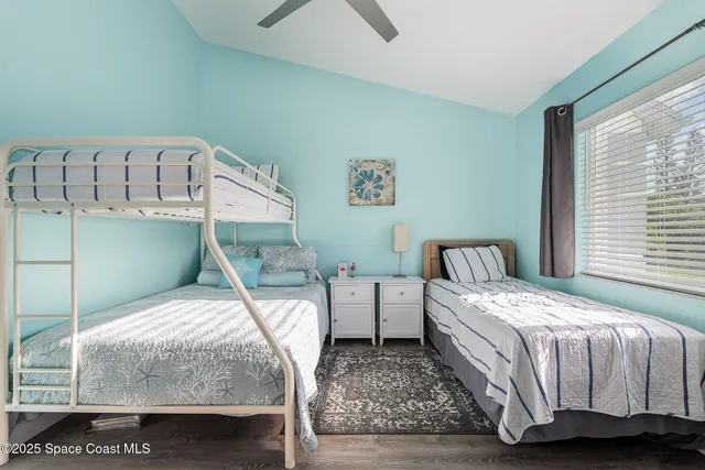 a view of storage and utility room with racks on the wall