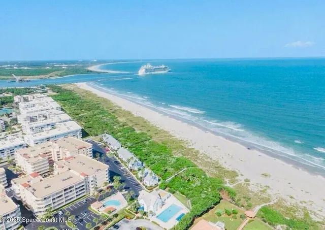 a sign that is sitting in front of a house