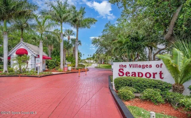 a picture of a bench in front of a building