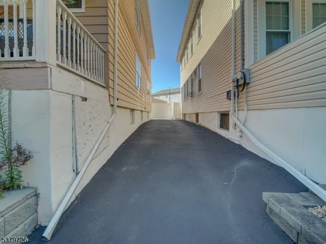 a view of a balcony with staircase