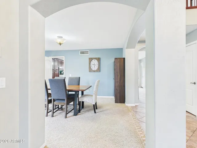 a view of a dining room with furniture