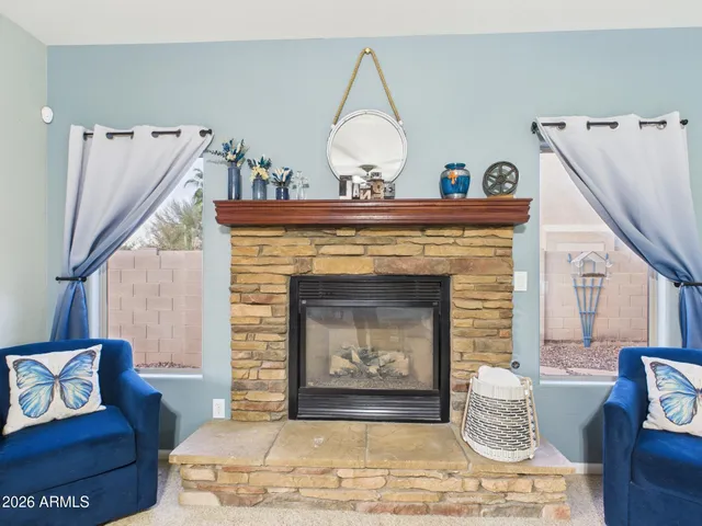 a kitchen with stainless steel appliances granite countertop a stove refrigerator sink and microwave