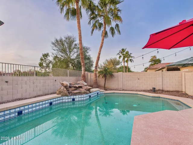 a view of a house with a swimming pool