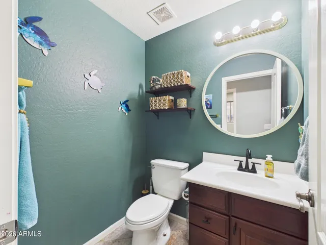 a view of a workspace with furniture and toys