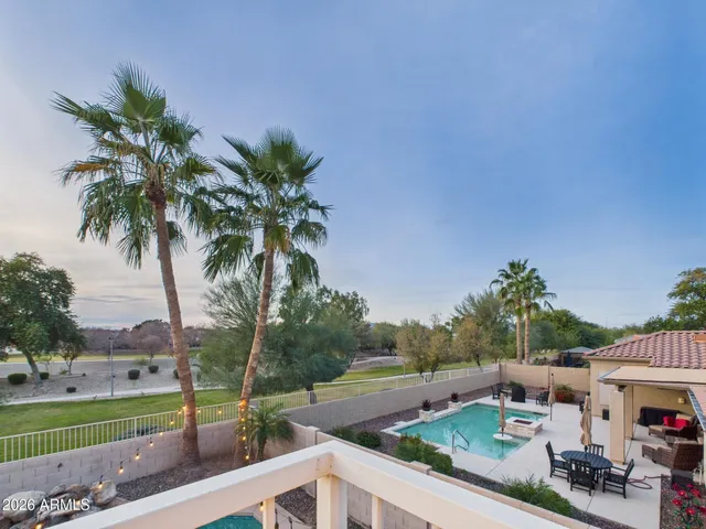 a view of walk in closet with clothes