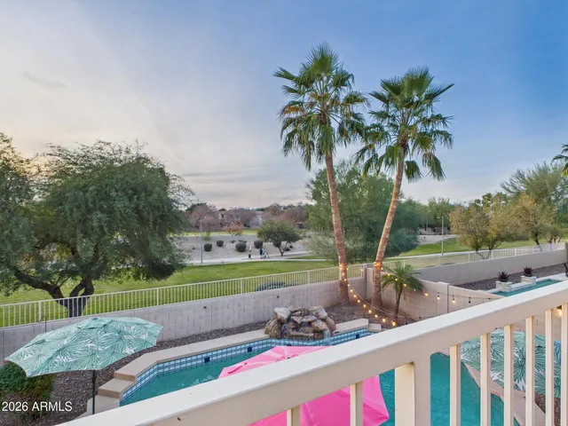 a bedroom with a bed and a tv