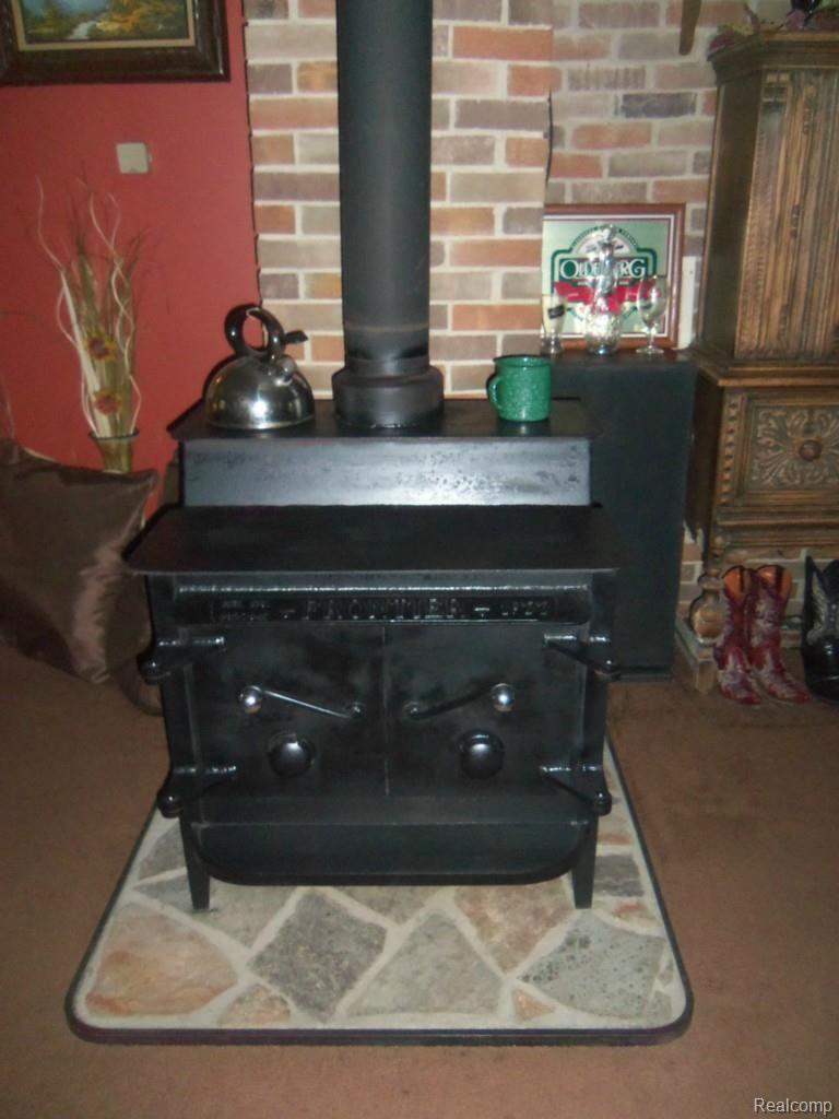5674 Hasslick Road North Branch, MI 48461 - Photo 21 of 21 Wood_stove.jpg