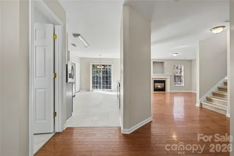 a view of livingroom with hardwood floor and hallway