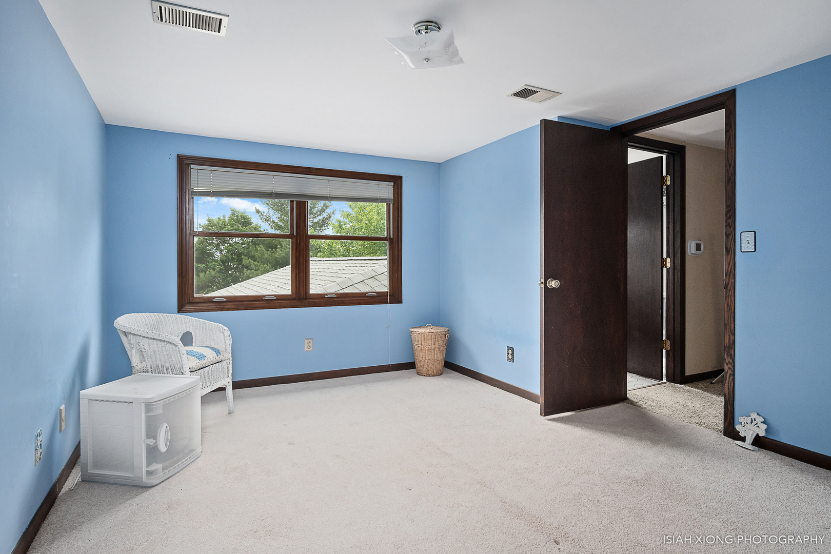 940 Deerpath Road North Aurora, IL 60542 - Photo 22 of 40 a view of an empty room with a window and a couch