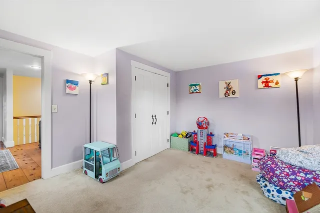 a bedroom with furniture and a bed