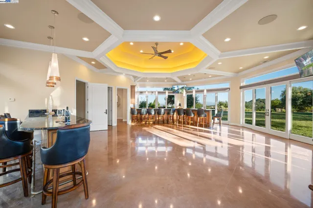 a lobby with furniture and a floor to ceiling window