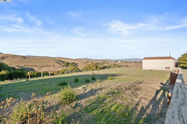 a view of a house with a mountain