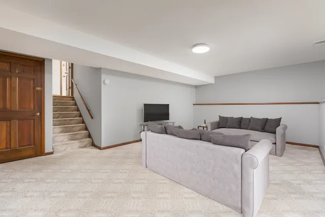 a outdoor living space with patio furniture and garden view