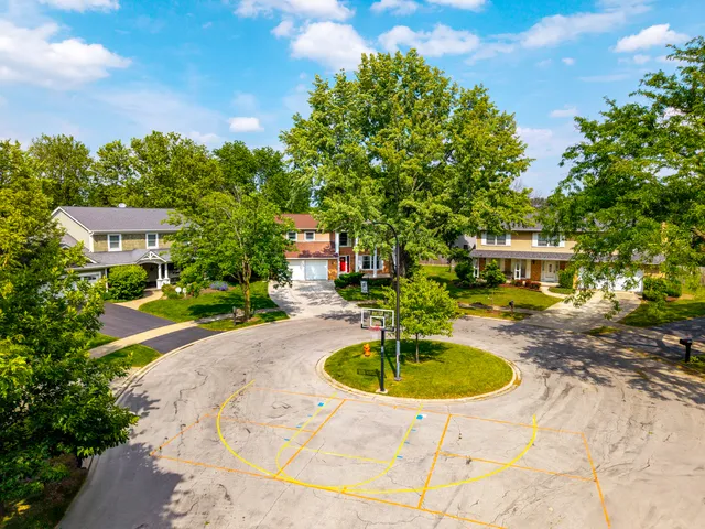 a view of a building with a yard